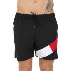 Tommy Hilfiger Badbyxor Tommy Hilfiger Logo Waistband Mid Length Swim Shorts PRIMARY