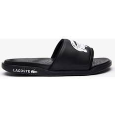 Lacoste Dam Tofflor & Sandaler Lacoste SERVE SLIDE DUAL 09221CMA black male Sandals & Slides now available at BSTN in